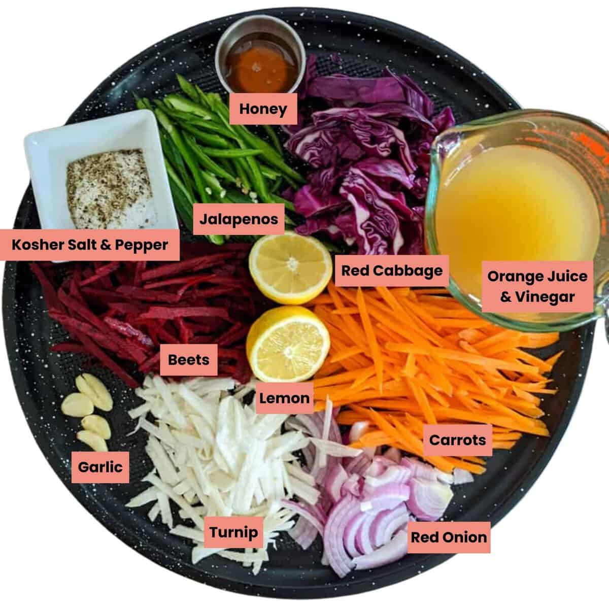 Colorful pickled vegetable ingredients arranged for a healthy, vibrant salad or slaw.