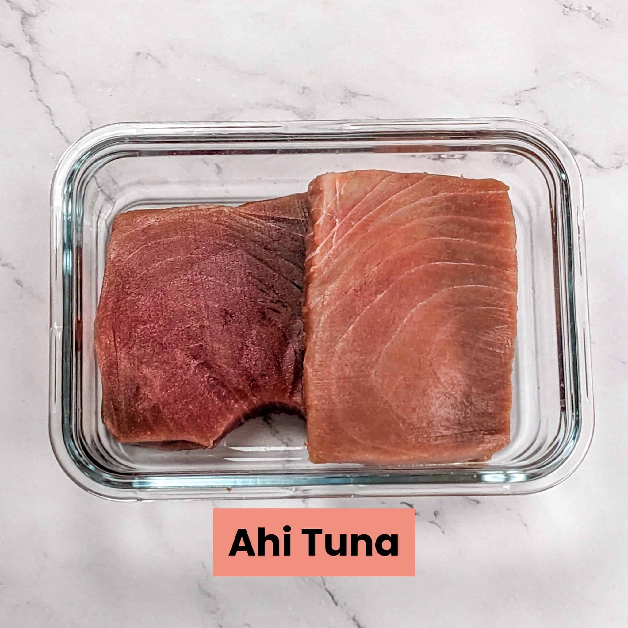 Ahi tuna steaks on a rectangle glass container.