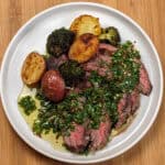 Grilled Steak with Spicy jalapeno Chimichurri sauce with a medley of roasted Baby Potatoes and Broccoli florets.
