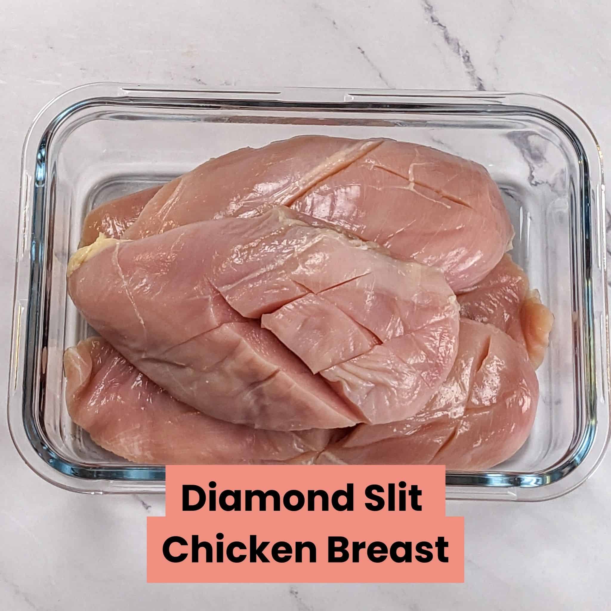 raw diamond slit chicken breast in a rectangle glass dish.