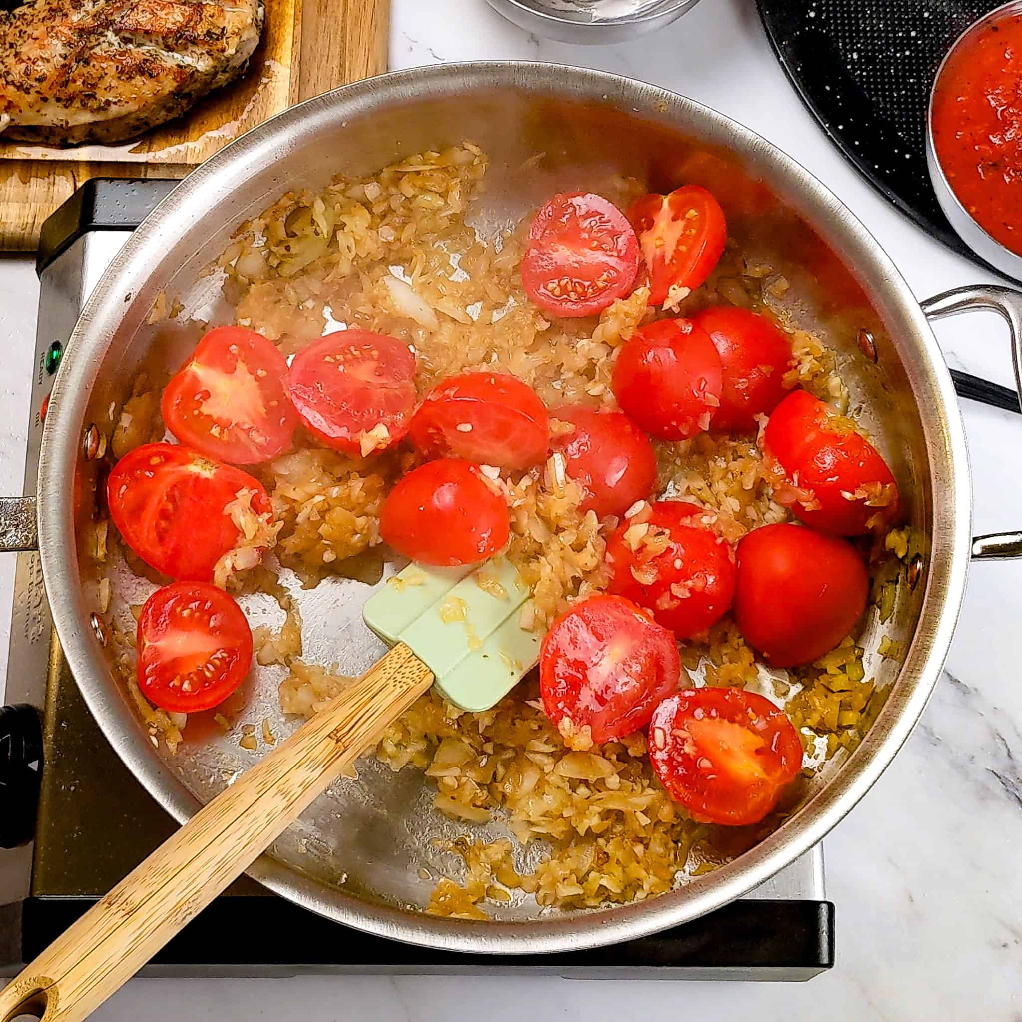 halved campari tomatoes and browned chopped onion in an all-clad saute pan.