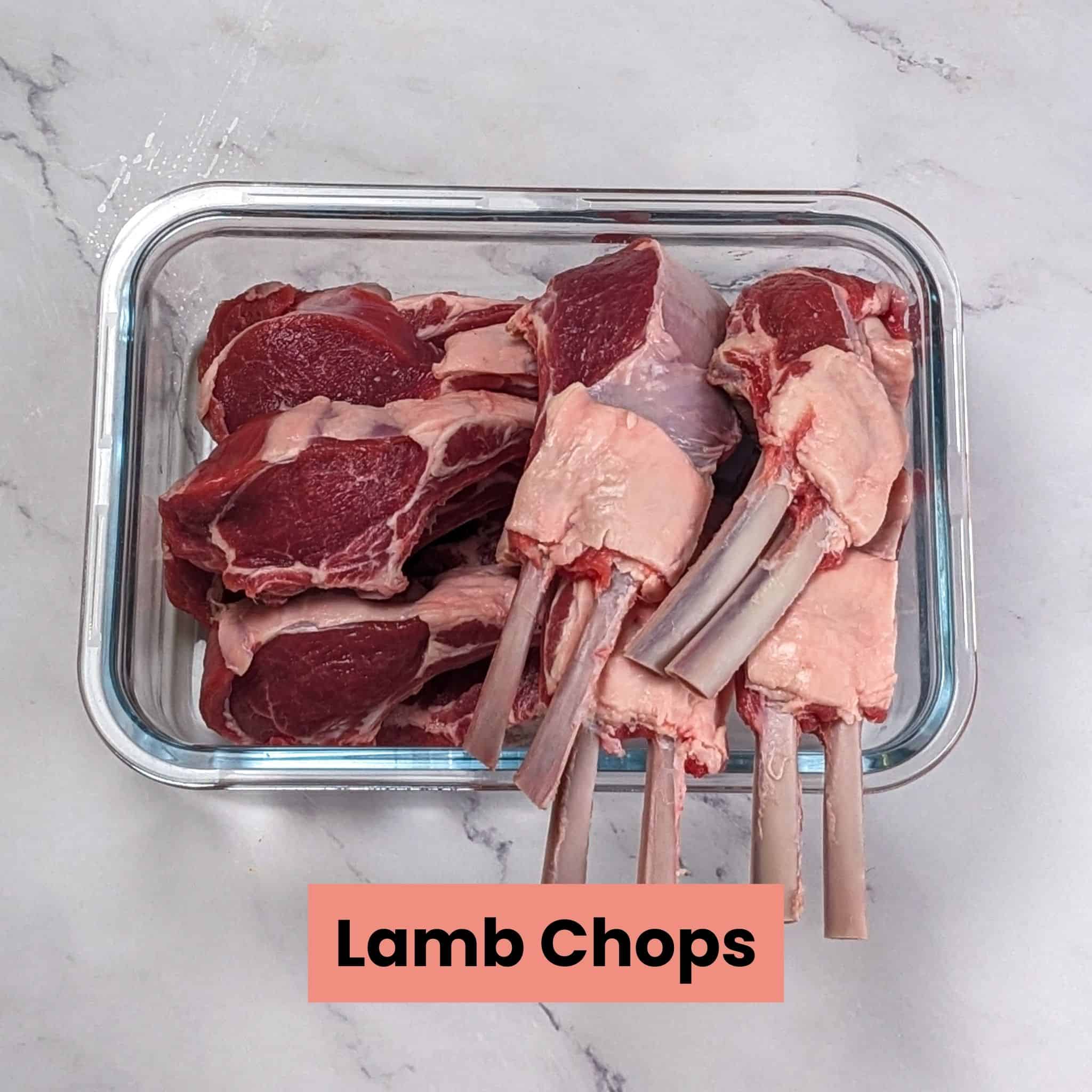 lamb chops in a glass rectangle dish.