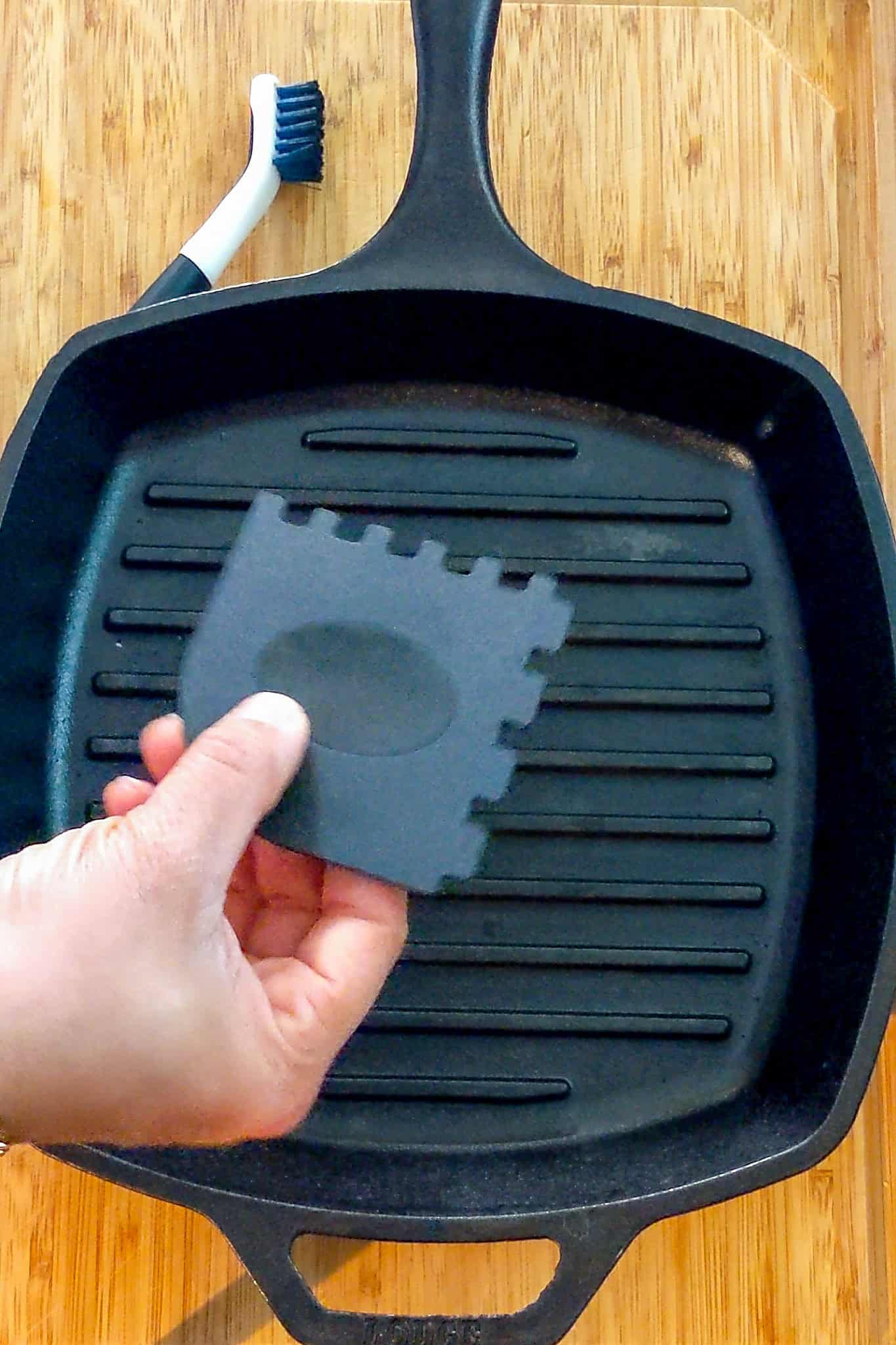 scrapper specifically for grill pan scrapping grill pan grates.