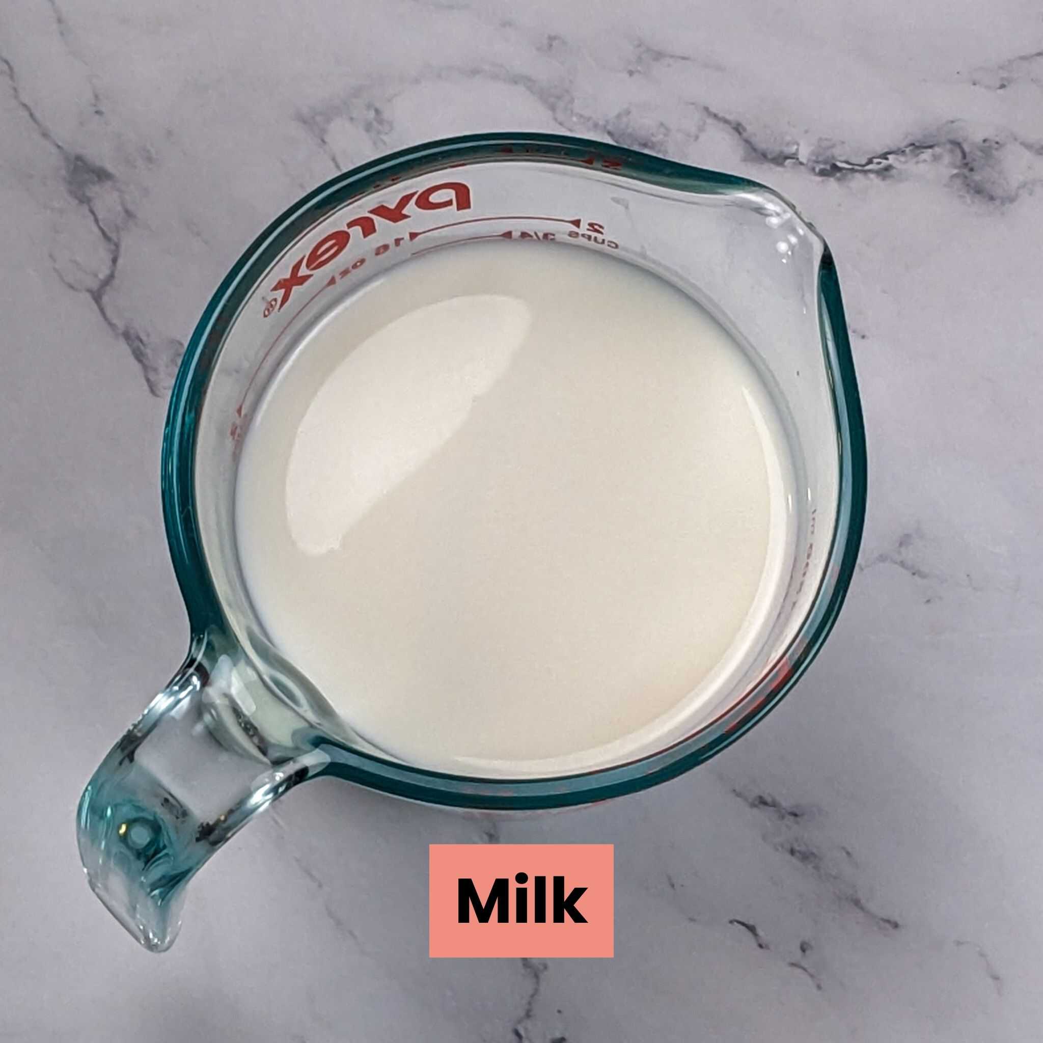 milk in a pyrex measuring cup.