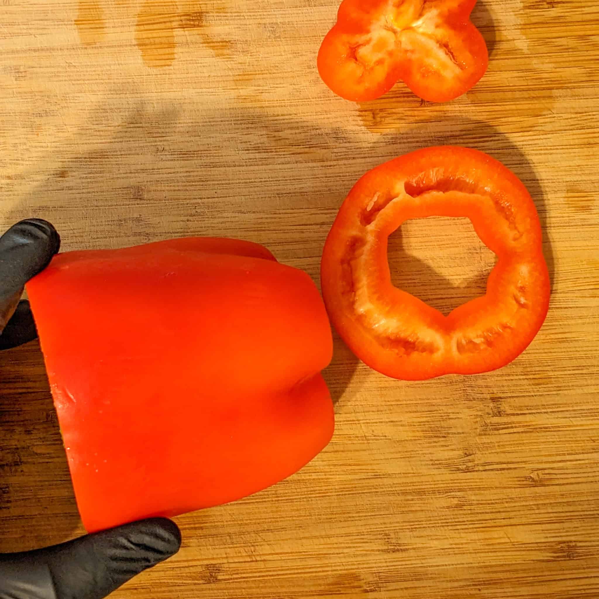 Top and bottom of bell pepper removed.