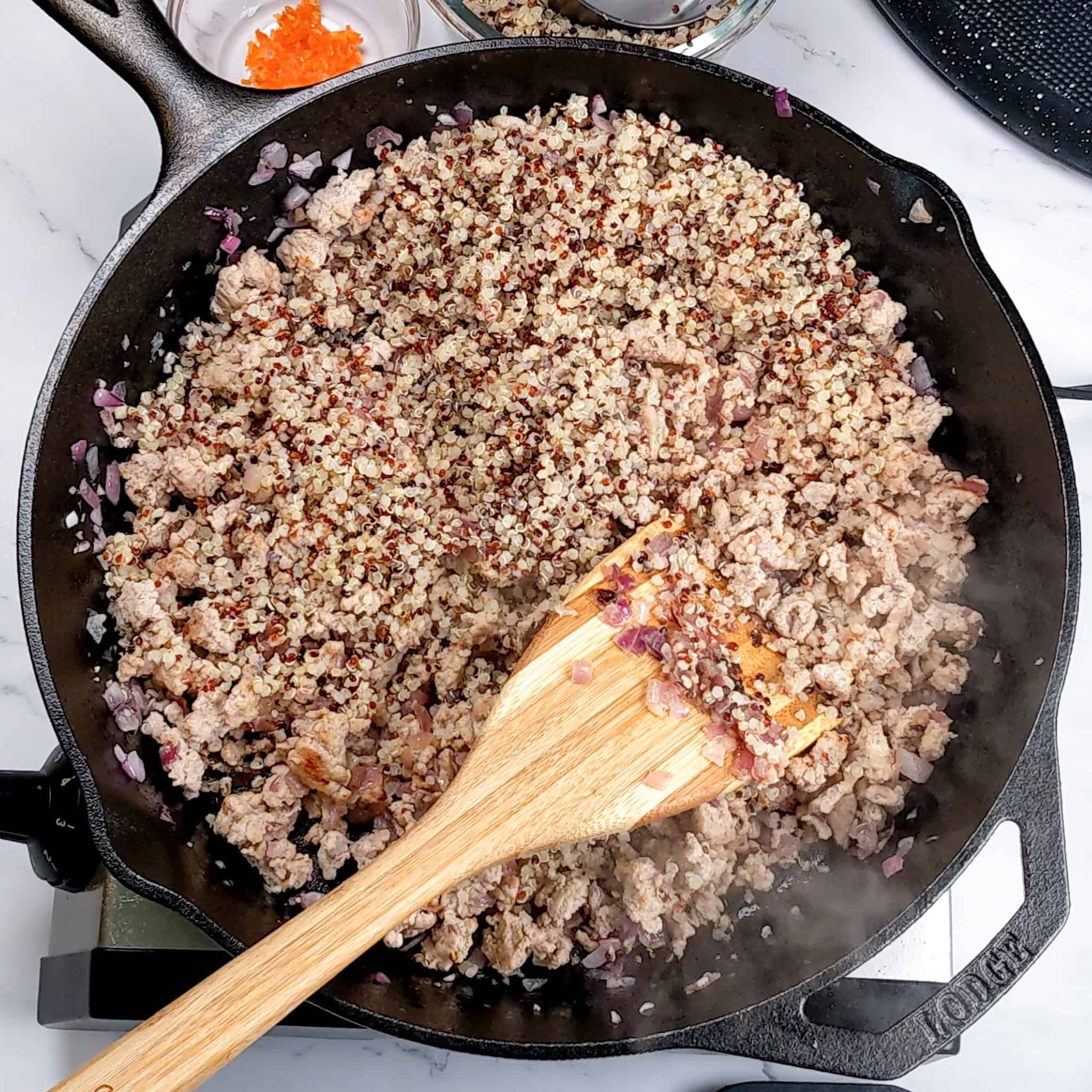 Finely crumbled ground turkey in a skillet.