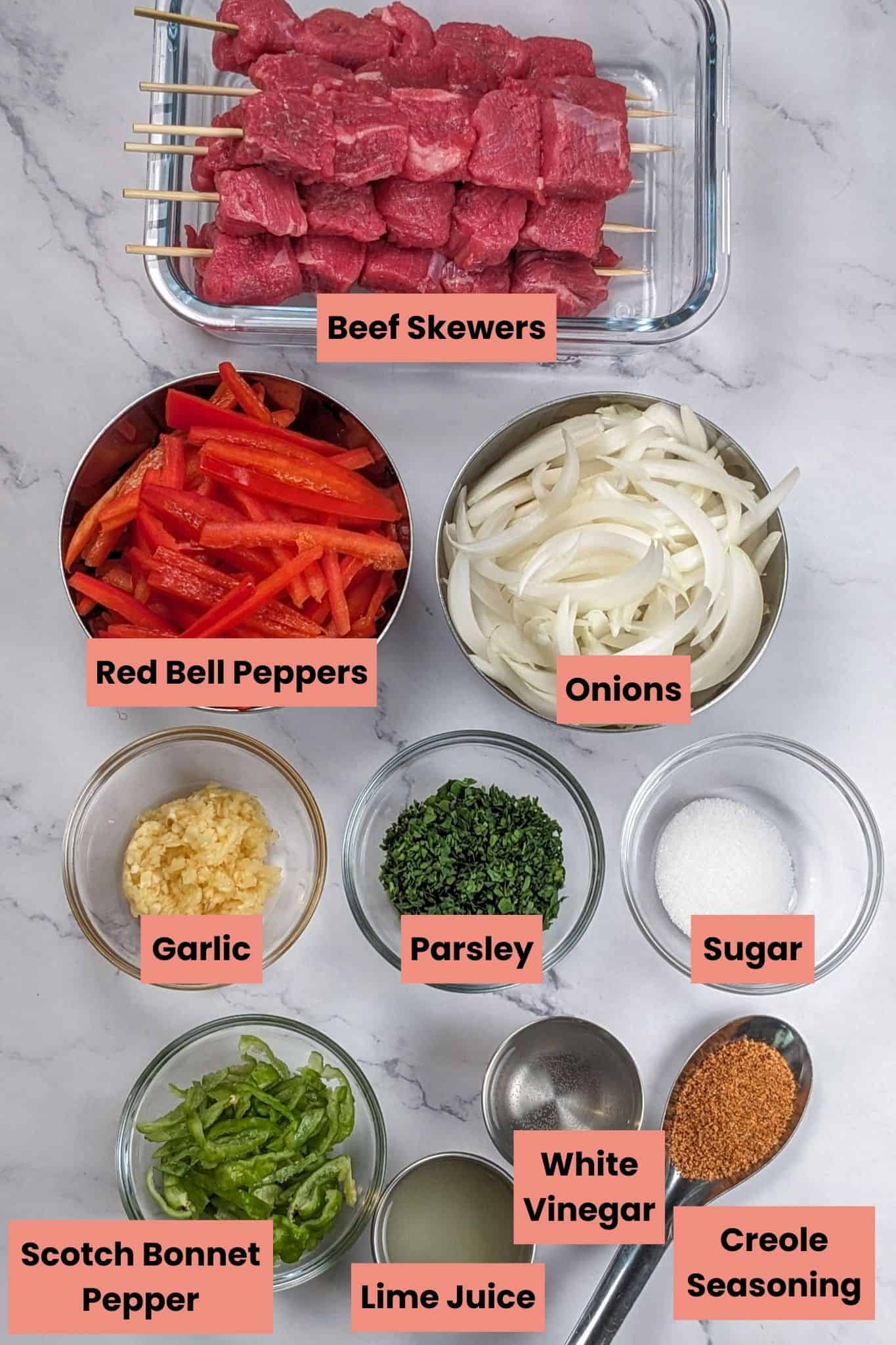 Ingredients for the beef marinade and escovitch recipe in containers.