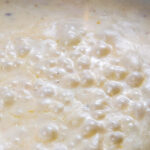 close up of the creamy garlic onion bechamel sauce.