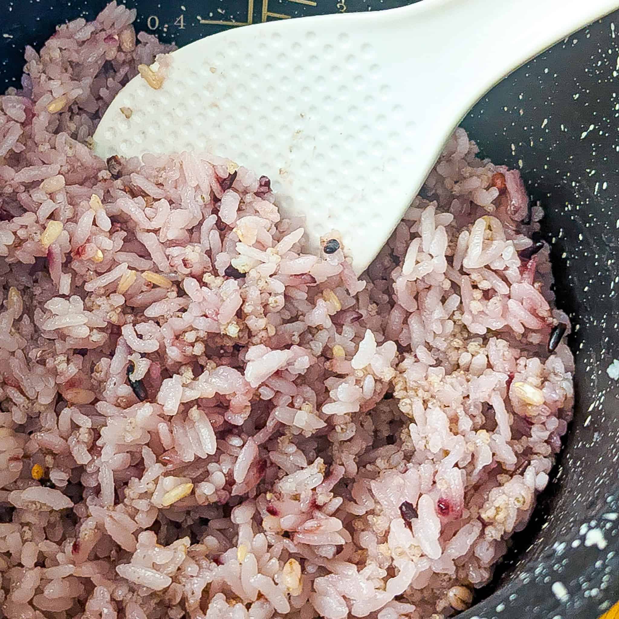 up close view of the multigrain rice in the rice cooker.