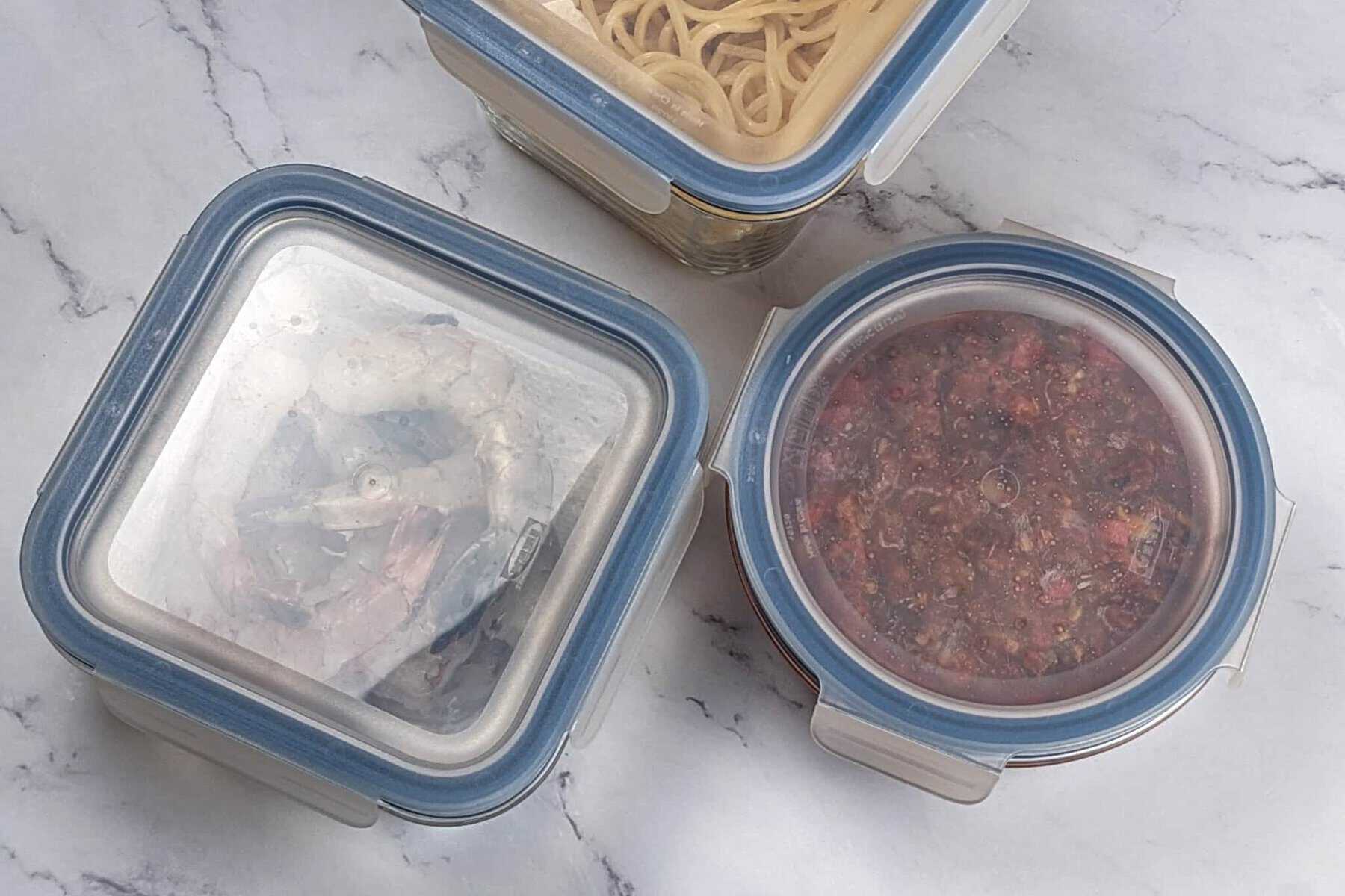 Leftovers in airtight glass containers with plastic clip-on lids.