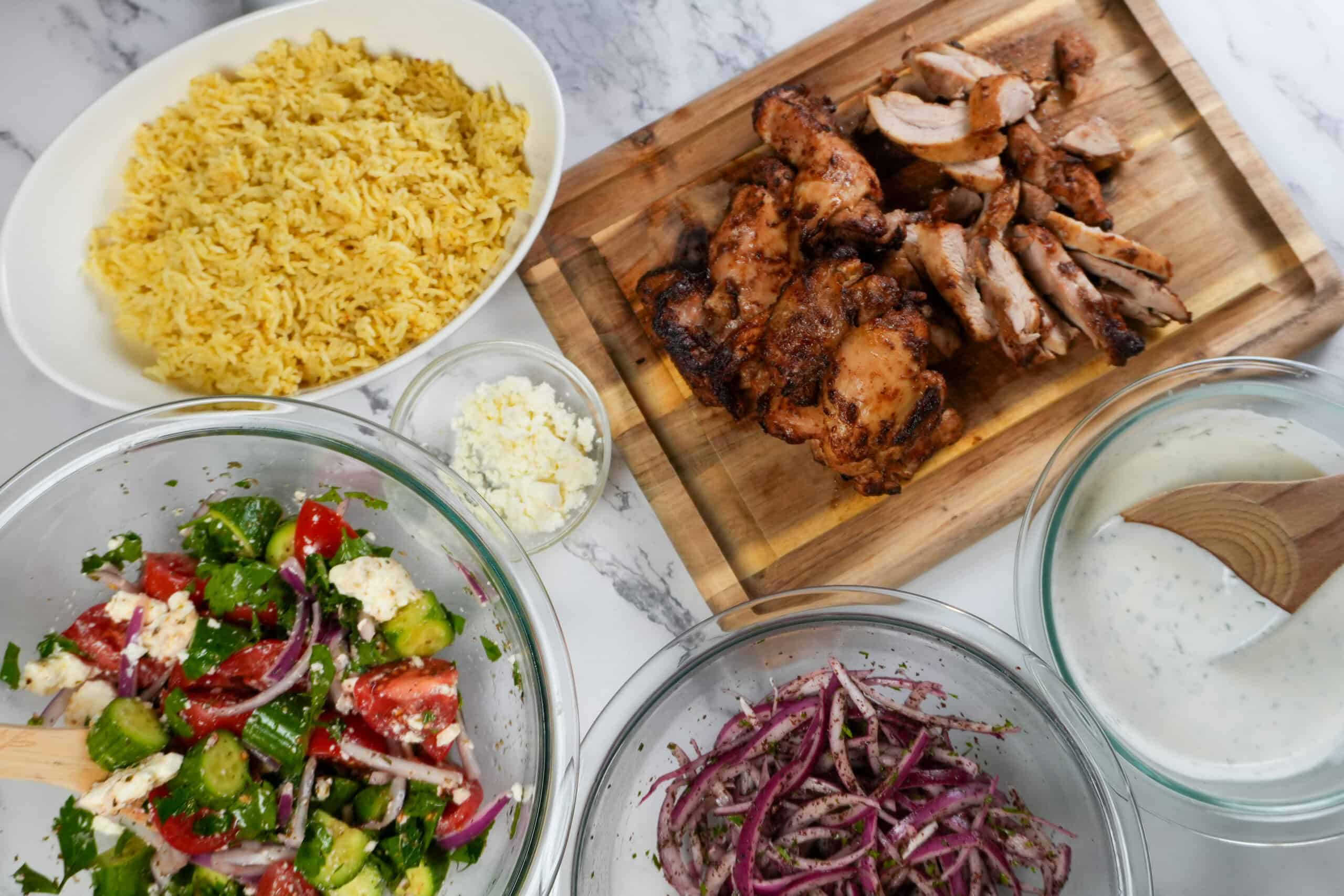 top view of the dishes in their separate form to make the chicken shawarma rice bowl.