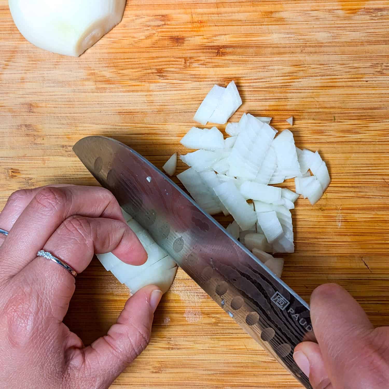 finishing up chopping the onion.