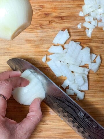 half way through chopping the onion.